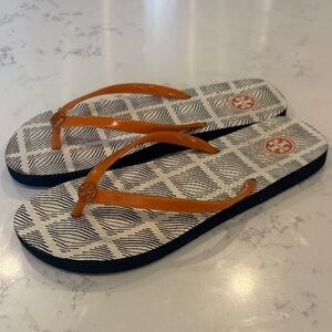 Tory Burch Orange and Black Patterned thongs